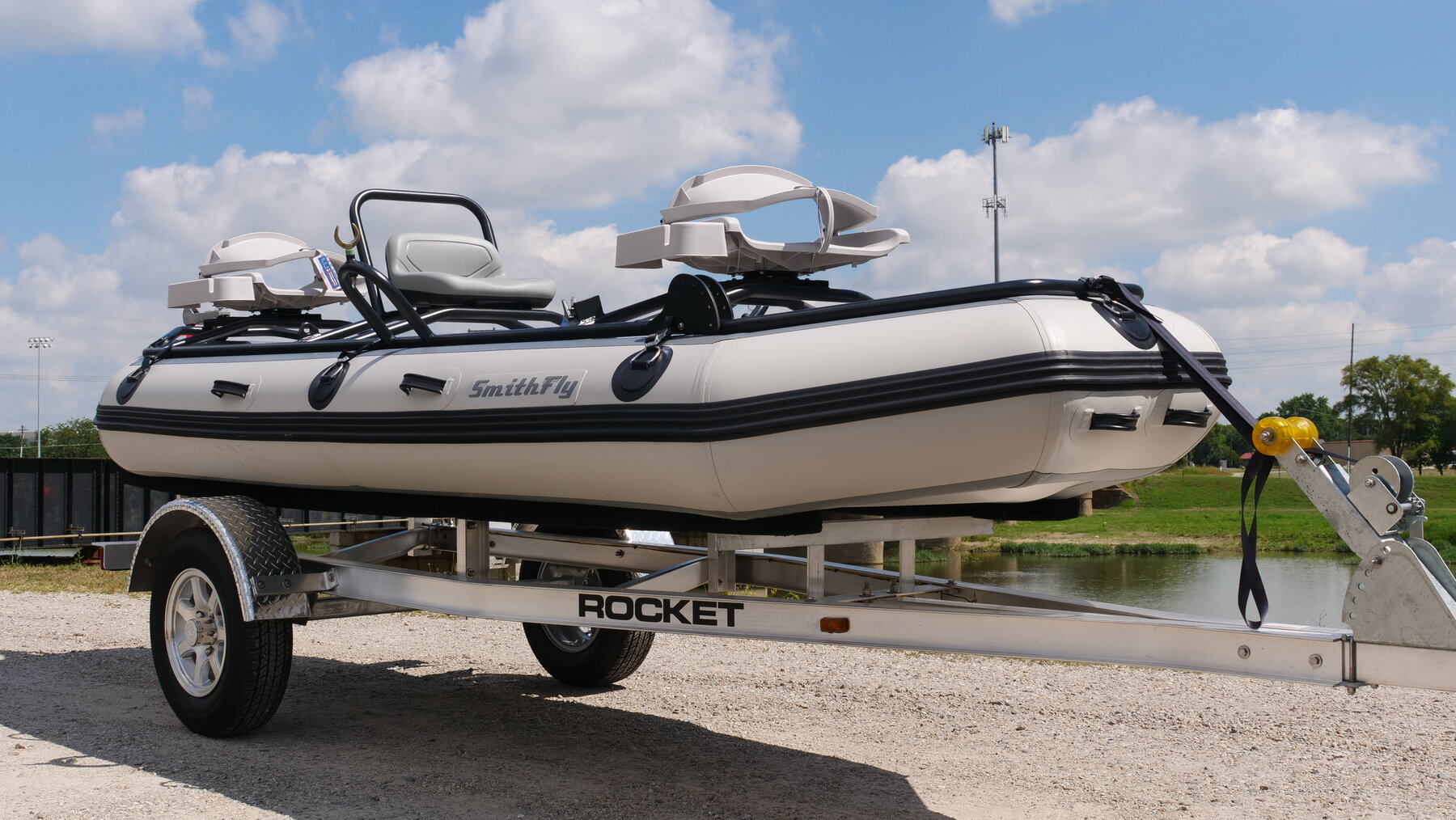 A SmithFly raft with full frame on a trailer, studio product shot